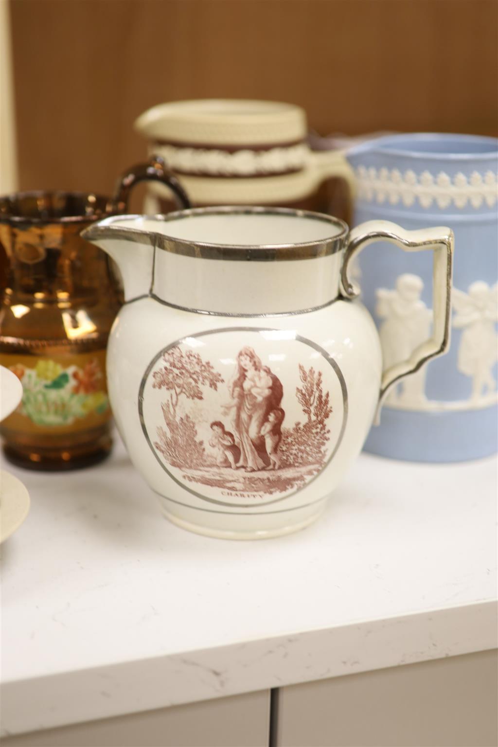 A Royal Doulton Lambeth silver rimmed jug and other various jugs including Copeland, lustreware etc.